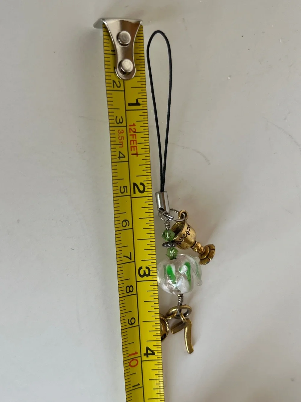 Gold Charm Phone Strap with Green-White Glass Bead